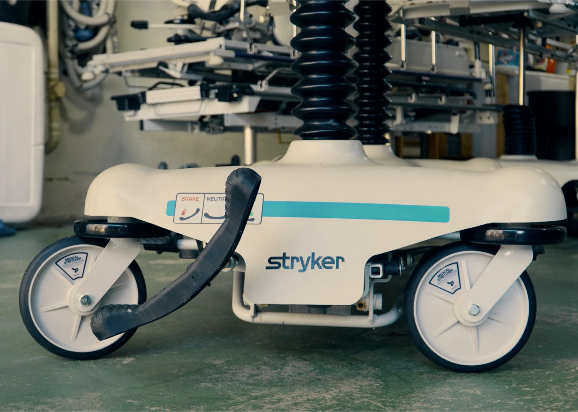 Stryker Stretcher Base with 8 Inch Replacement Wheels Installed